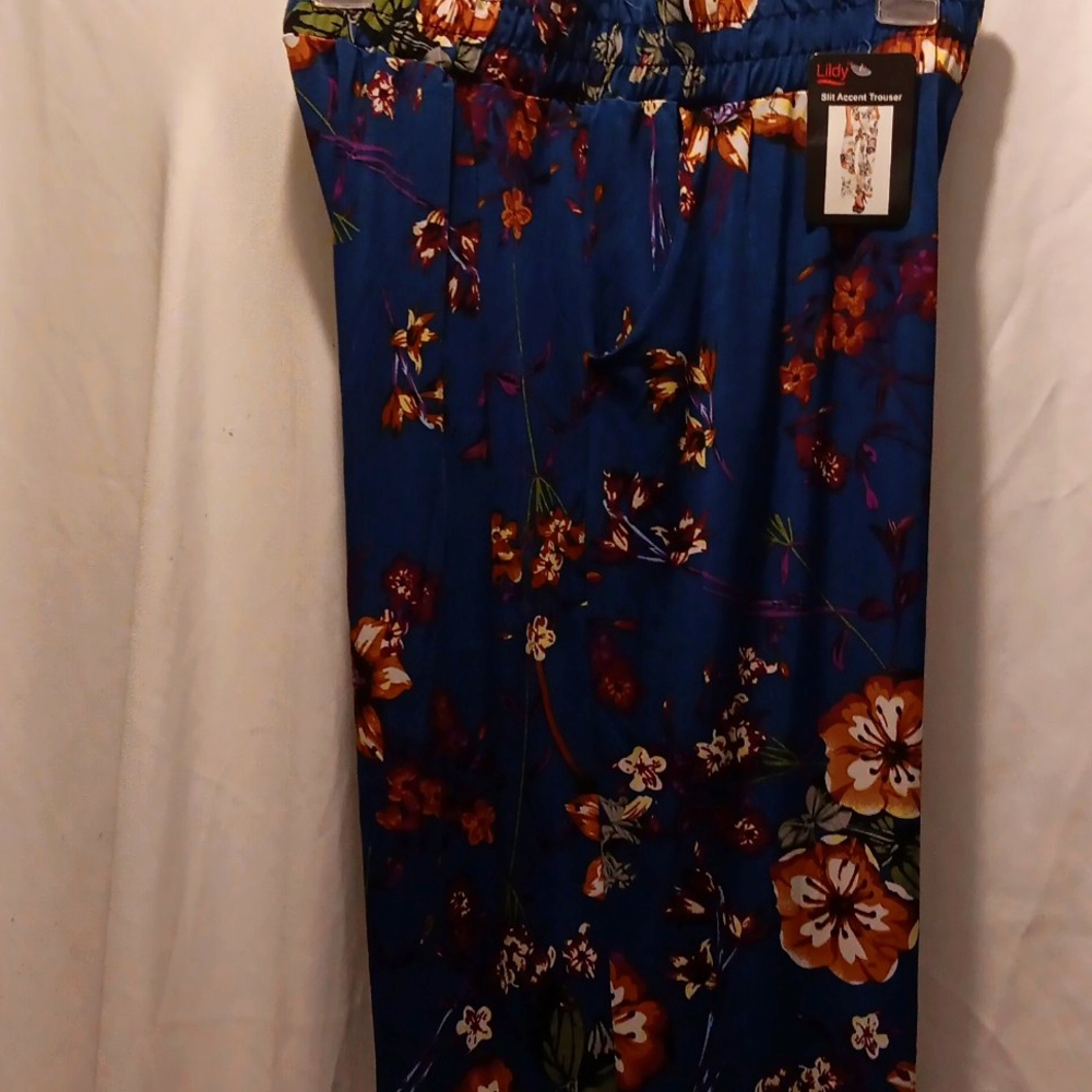 Lillys Floral Slit accent trouser L  Xl Teal with floral background. Purple ext